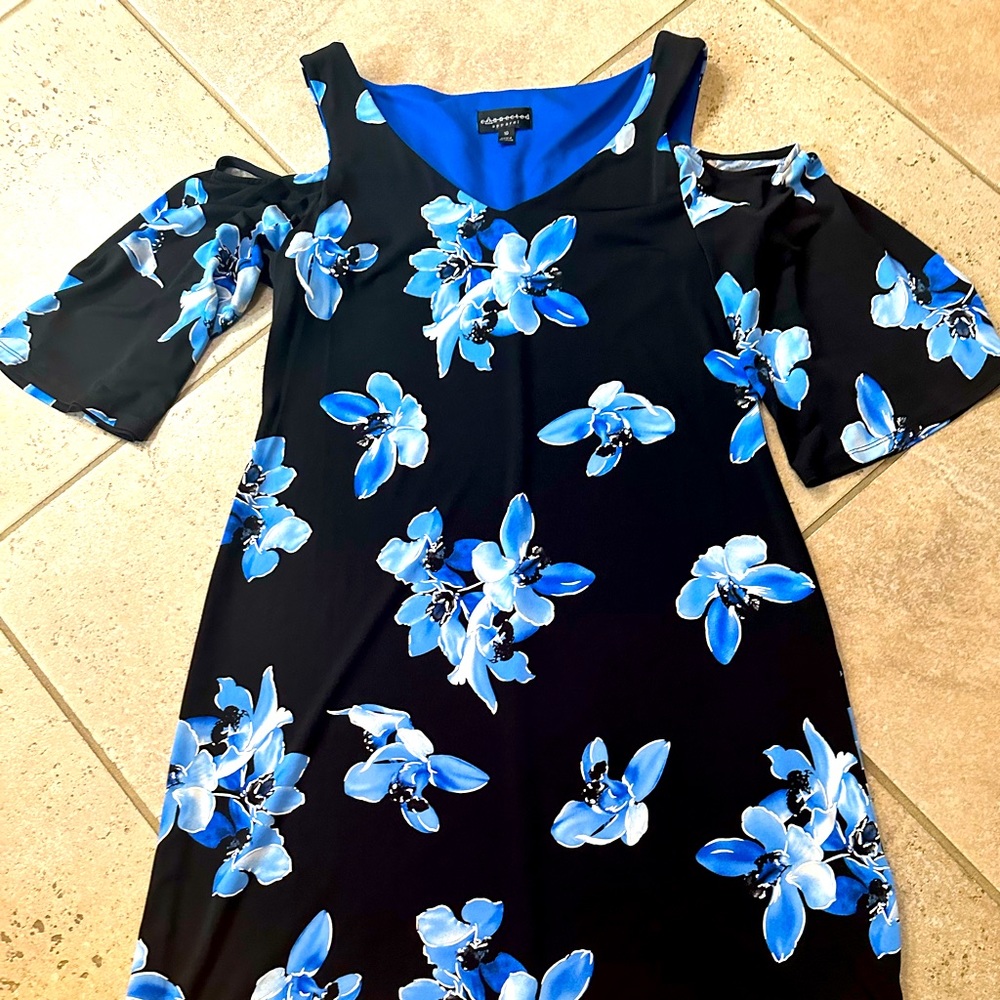 Black dress with print and shoulder cut out.